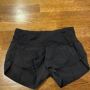 Black lululemon shorts with reflective zipper on back